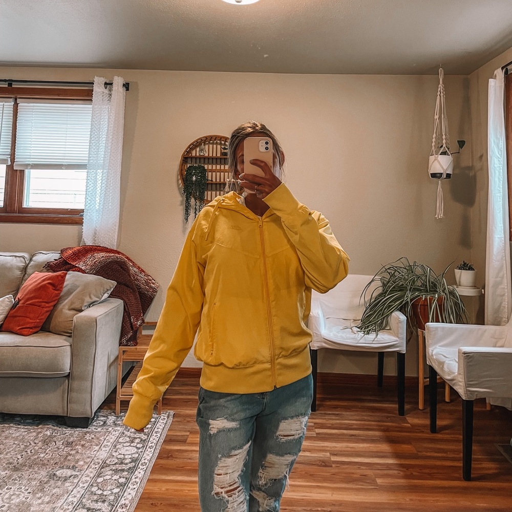 - Yellow Nike zip up windbreaker